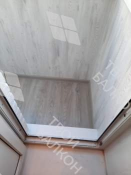 Отделка и остекление Г-образного балкона