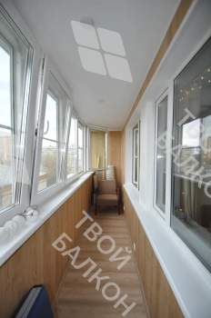 Остекление лоджии окнами с мультифункциональным стеклопакетом и отделка
