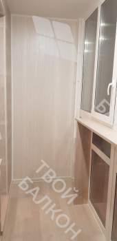 Панорамное остекление с тонировкой и отделка балкона