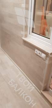 Панорамное остекление с тонировкой и отделка балкона